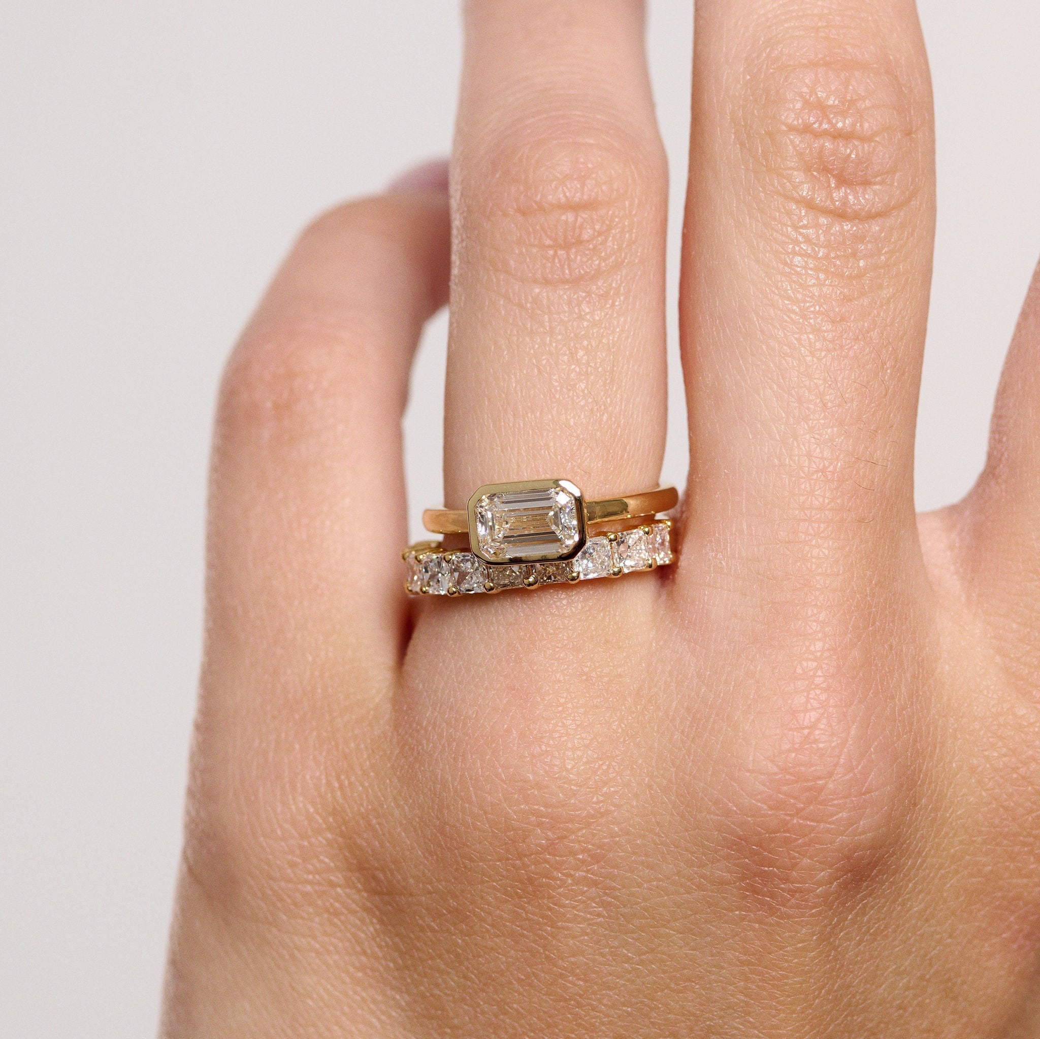 Rings-The Stephanie is truly effortless and timeless. The full bezel setting around the emerald cut diamond makes this ring unique and bold. Fall in love forever with this stunning design.-ELIISE MAAR JEWELLERY