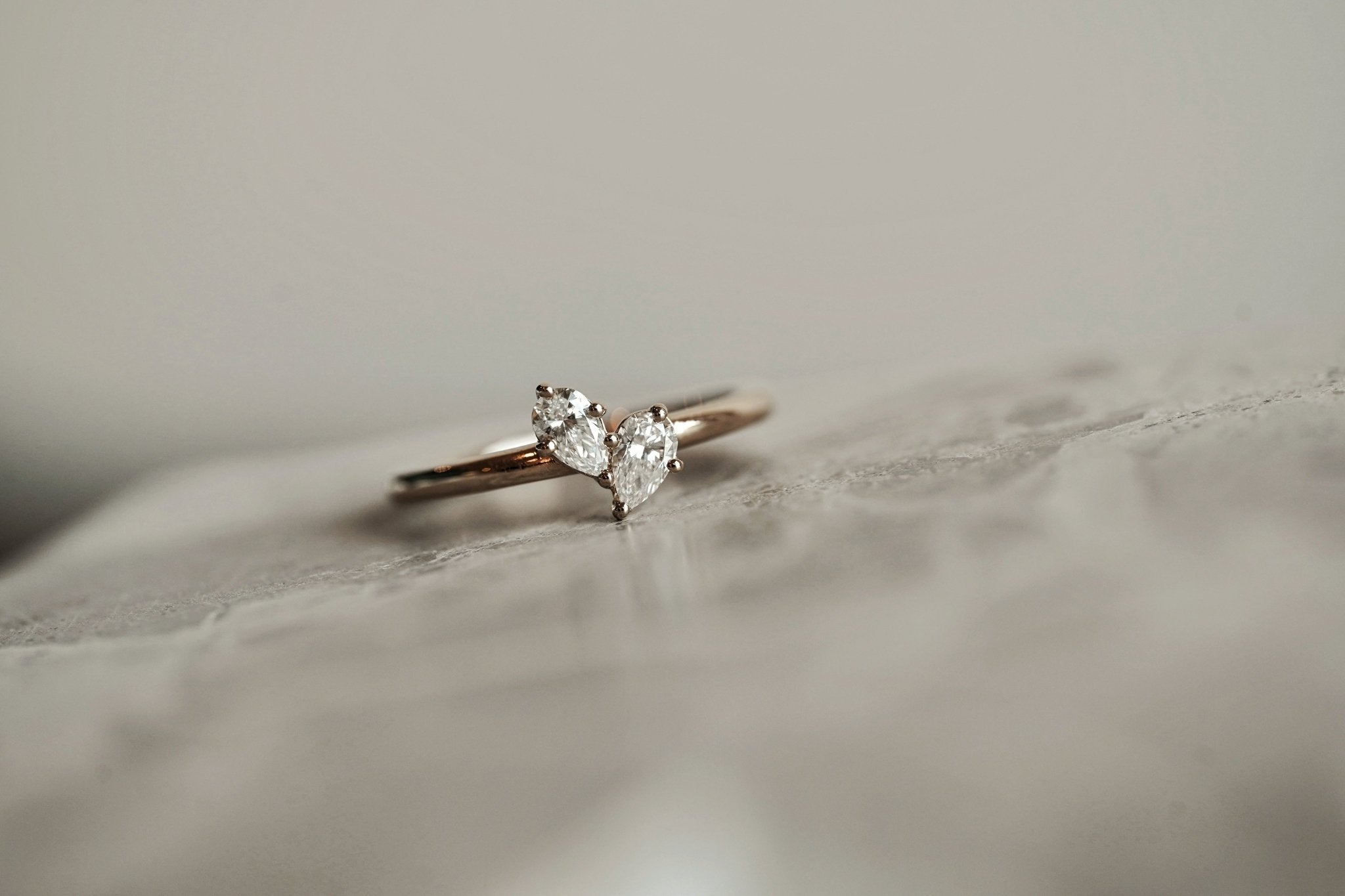 Necklaces-This enchanting heart shaped birthstone necklace looks like a spark of celestial beauty. Two individual, sparkling pear-shaped stones, customizable to each of your beloved's birth months. Other Half Ring- Features 5x3 Pear Cut Gemstones (total carat weigh 0.60ct) JANUARY Garnet FEBRUARY Amethyst MARCH Aquamarine APRIL Diamond MAY Emerald JUNE Pearl JULY Ruby AUGUST Peridot SEPTEMBER Sapphire OCTOBER Tourmaline NOVEMBER Citrine DECEMBER Blue Topaz Whether worn as a reminder of someone special in yo