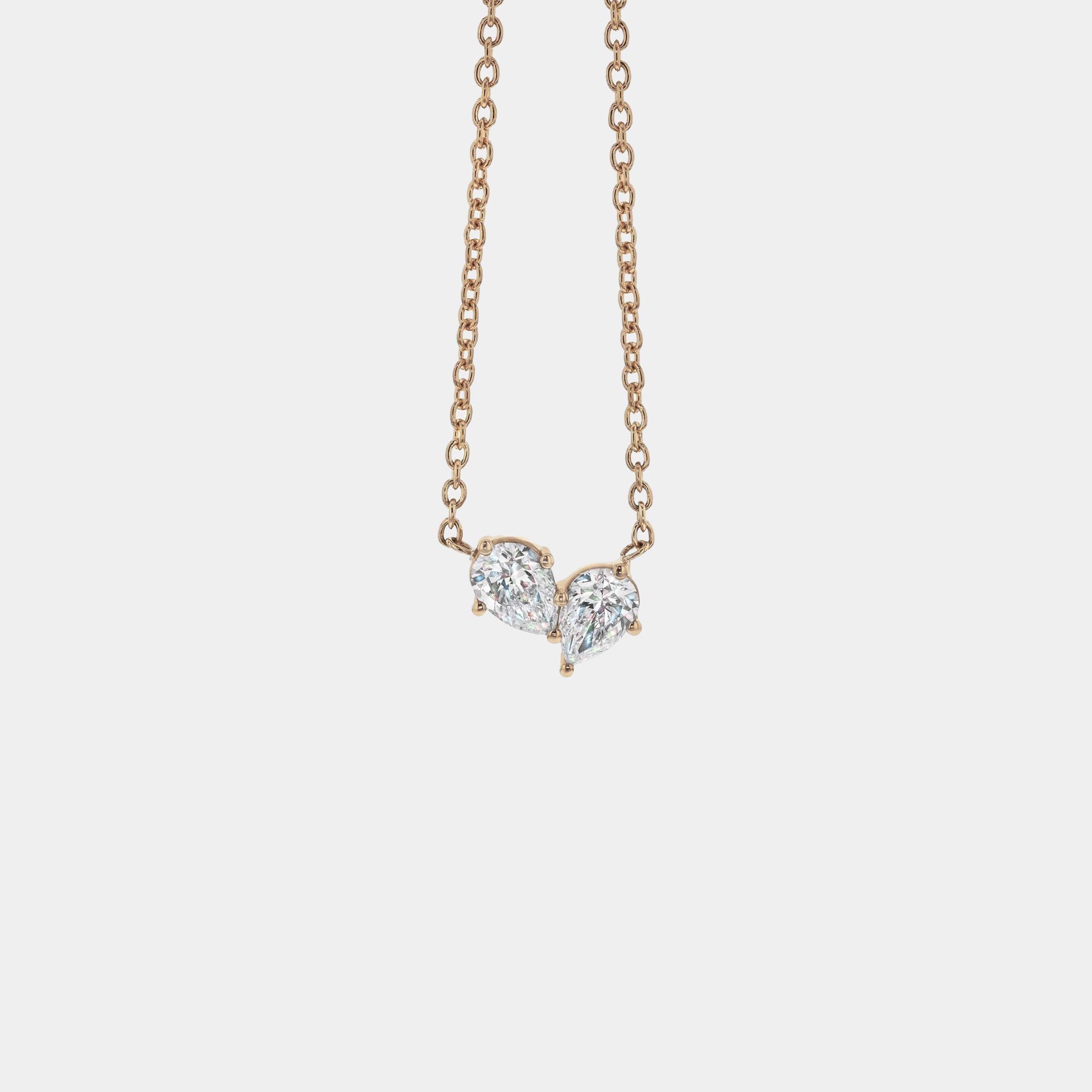 Necklaces-This enchanting heart shaped birthstone necklace looks like a spark of celestial beauty. Two individual, sparkling pear-shaped stones, customizable to each of your beloved's birth months. Luxe Necklace - Features 6x4 Pear Cut Gemstones (total carat weigh 1.00ct) JANUARY Garnet FEBRUARY Amethyst MARCH Aquamarine APRIL Diamond MAY Emerald JUNE Pearl JULY Ruby AUGUST Peridot SEPTEMBER Sapphire OCTOBER Tourmaline NOVEMBER Citrine DECEMBER Blue Topaz Whether worn as a reminder of someone special in you