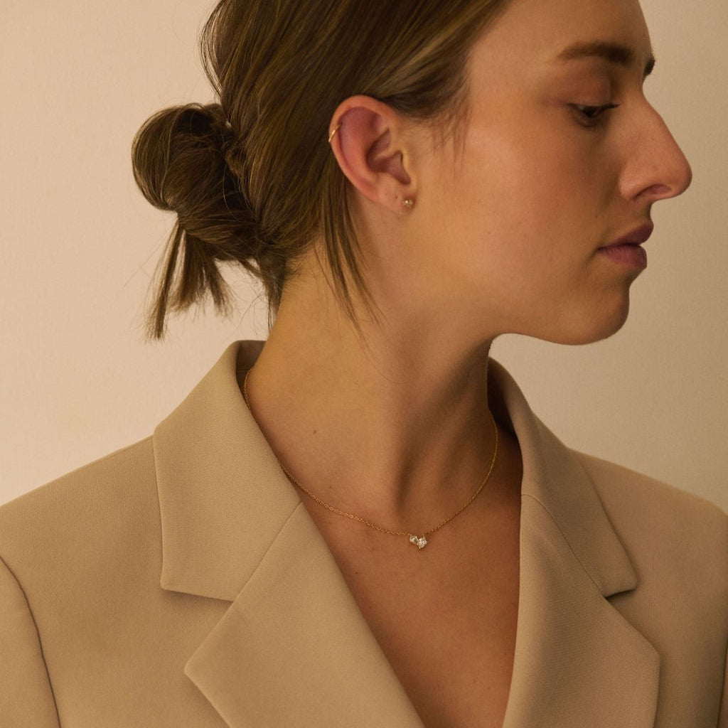 Necklaces-This enchanting heart shaped birthstone necklace looks like a spark of celestial beauty. Two individual, sparkling pear-shaped stones, customizable to each of your beloved's birth months. Luxe Necklace - Features 6x4 Pear Cut Gemstones (total carat weigh 1.00ct) JANUARY Garnet FEBRUARY Amethyst MARCH Aquamarine APRIL Diamond MAY Emerald JUNE Pearl JULY Ruby AUGUST Peridot SEPTEMBER Sapphire OCTOBER Tourmaline NOVEMBER Citrine DECEMBER Blue Topaz Whether worn as a reminder of someone special in you