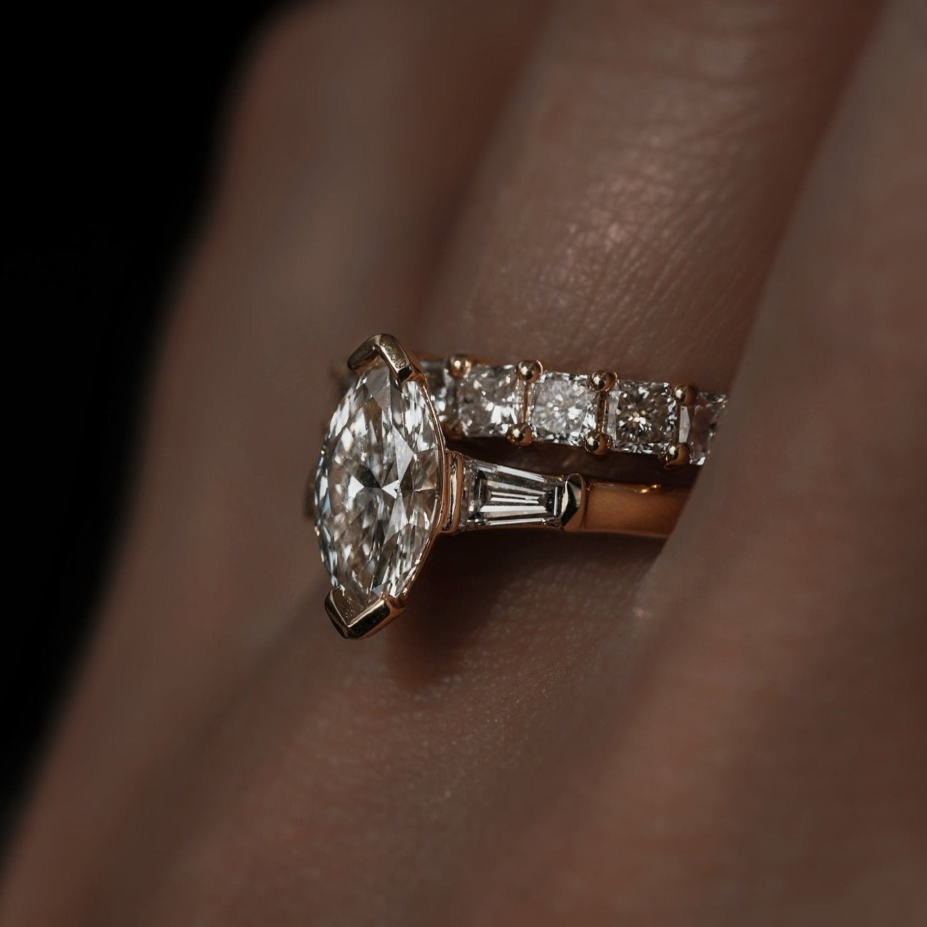 Rings-Your perfect art-deco dream. The striking beauty of the marquise diamond is the focus of this stunning engagement ring. The trilogy arrangement with the tapered baguettes on either side of the centre stone creates a crescendo of sparkling beauty. - VIDEO 1- VIDEO 2-ELIISE MAAR JEWELLERY