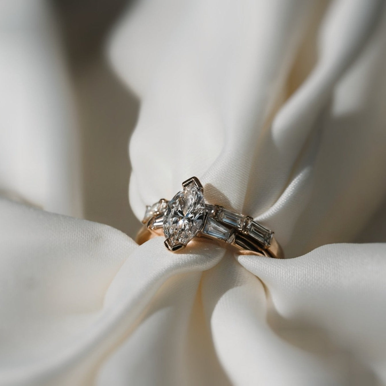 Rings-Your perfect art-deco dream. The striking beauty of the marquise diamond is the focus of this stunning engagement ring. The trilogy arrangement with the tapered baguettes on either side of the centre stone creates a crescendo of sparkling beauty. - VIDEO 1- VIDEO 2-ELIISE MAAR JEWELLERY