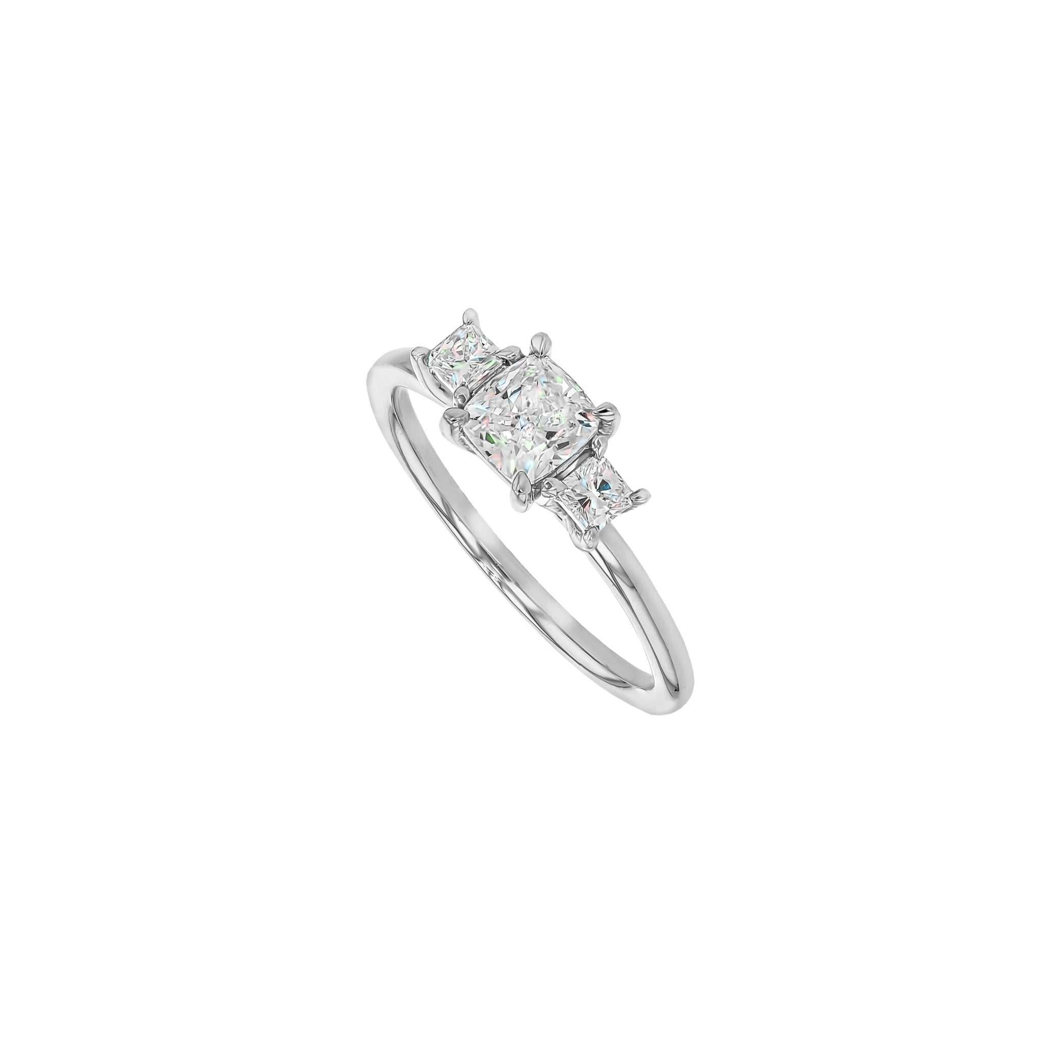 Rings-This elegant trilogy features a cushion cut centre diamond with a brilliant princess cut 0.30ct diamond on either side. VIDEO-ELIISE MAAR JEWELLERY