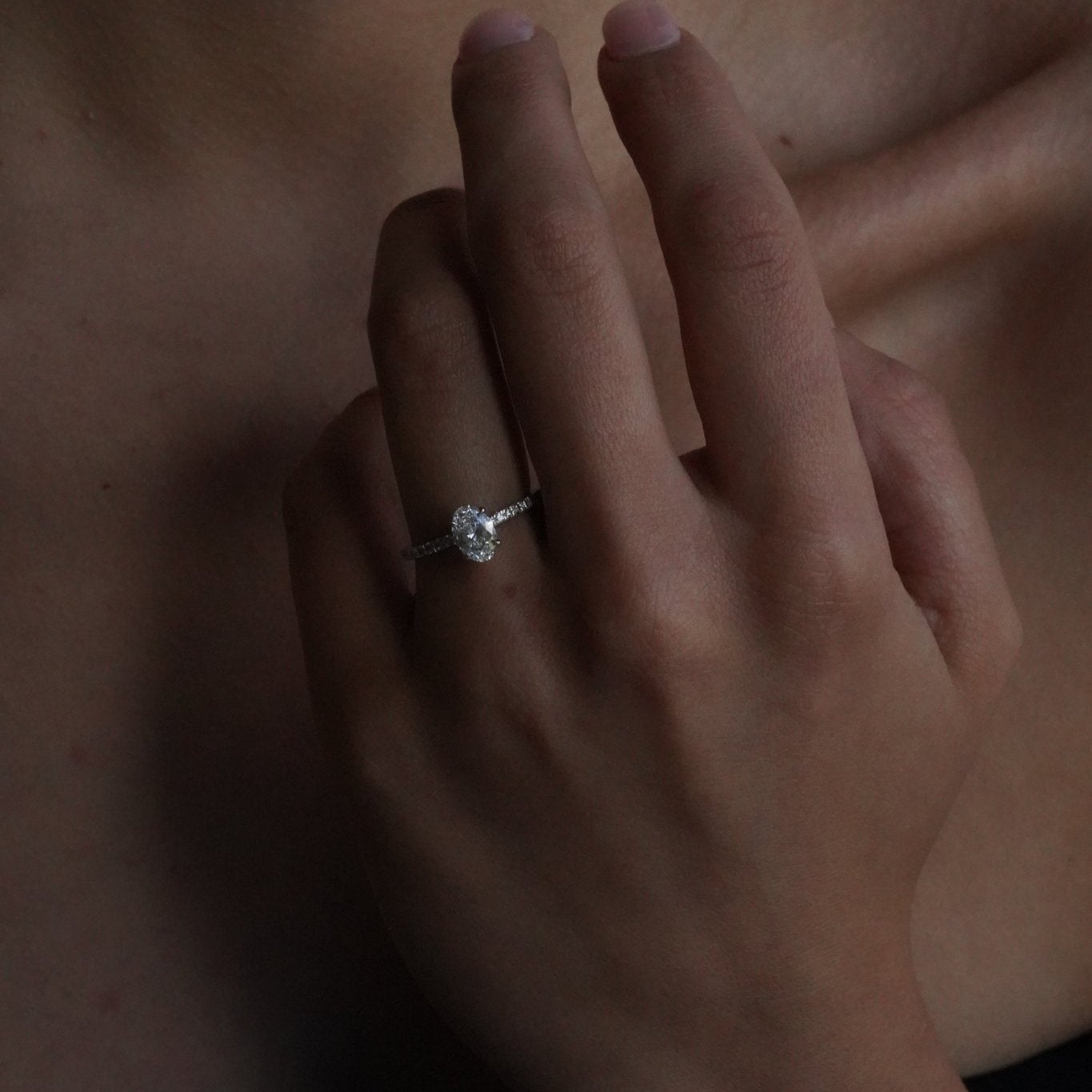 Rings-A elegant engagement ring with a beautiful half eternity pavé diamond band. The striking fire of the side diamonds enhance the brilliance of the oval cut centre diamond. Pair the Lena with with Fine Lavish diamond band for a matching set. Available with an oval or pear shaped diamond.-ELIISE MAAR JEWELLERY