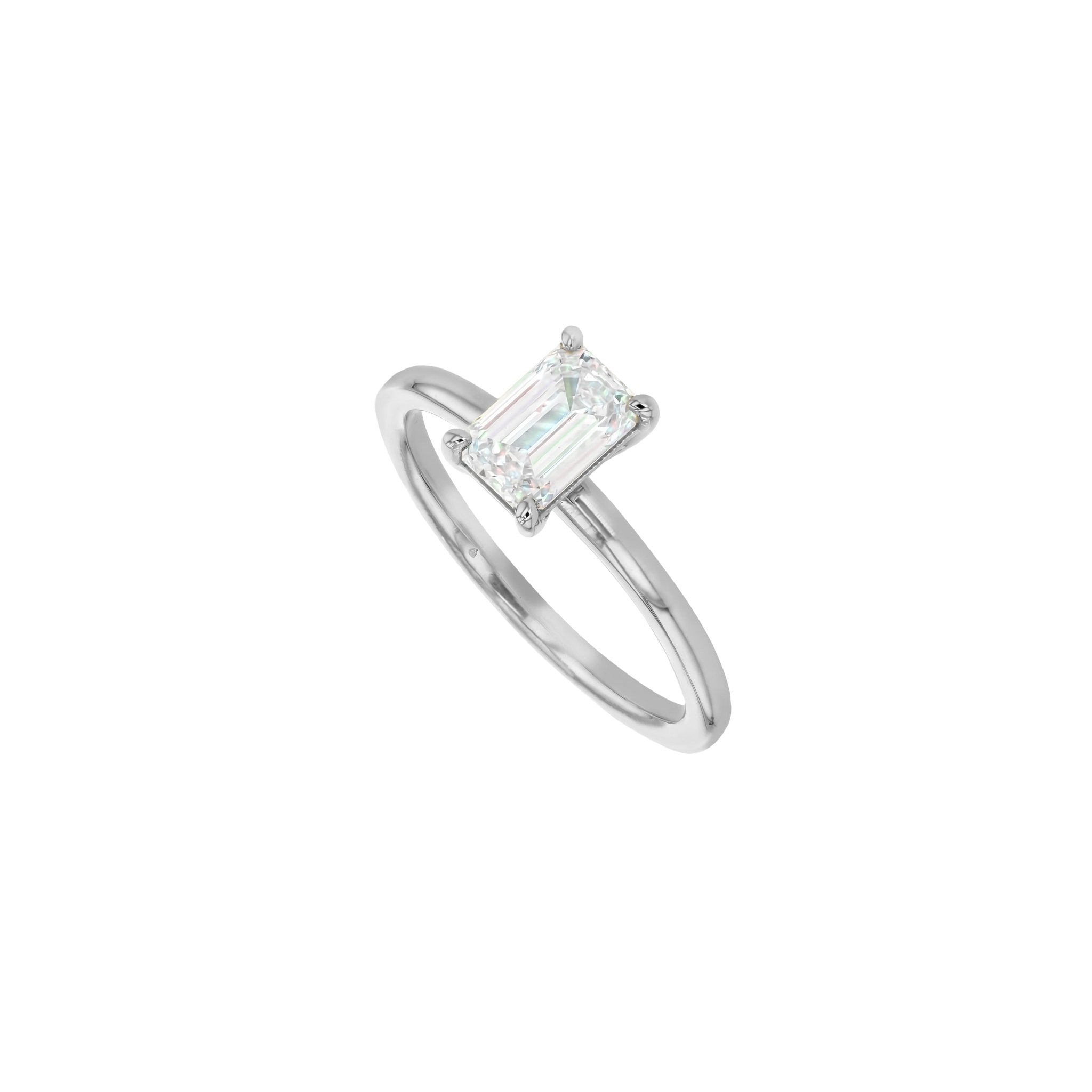 Rings-A classic solitaire featuring an emerald cut diamond. Available in various diamond sizes.-ELIISE MAAR JEWELLERY