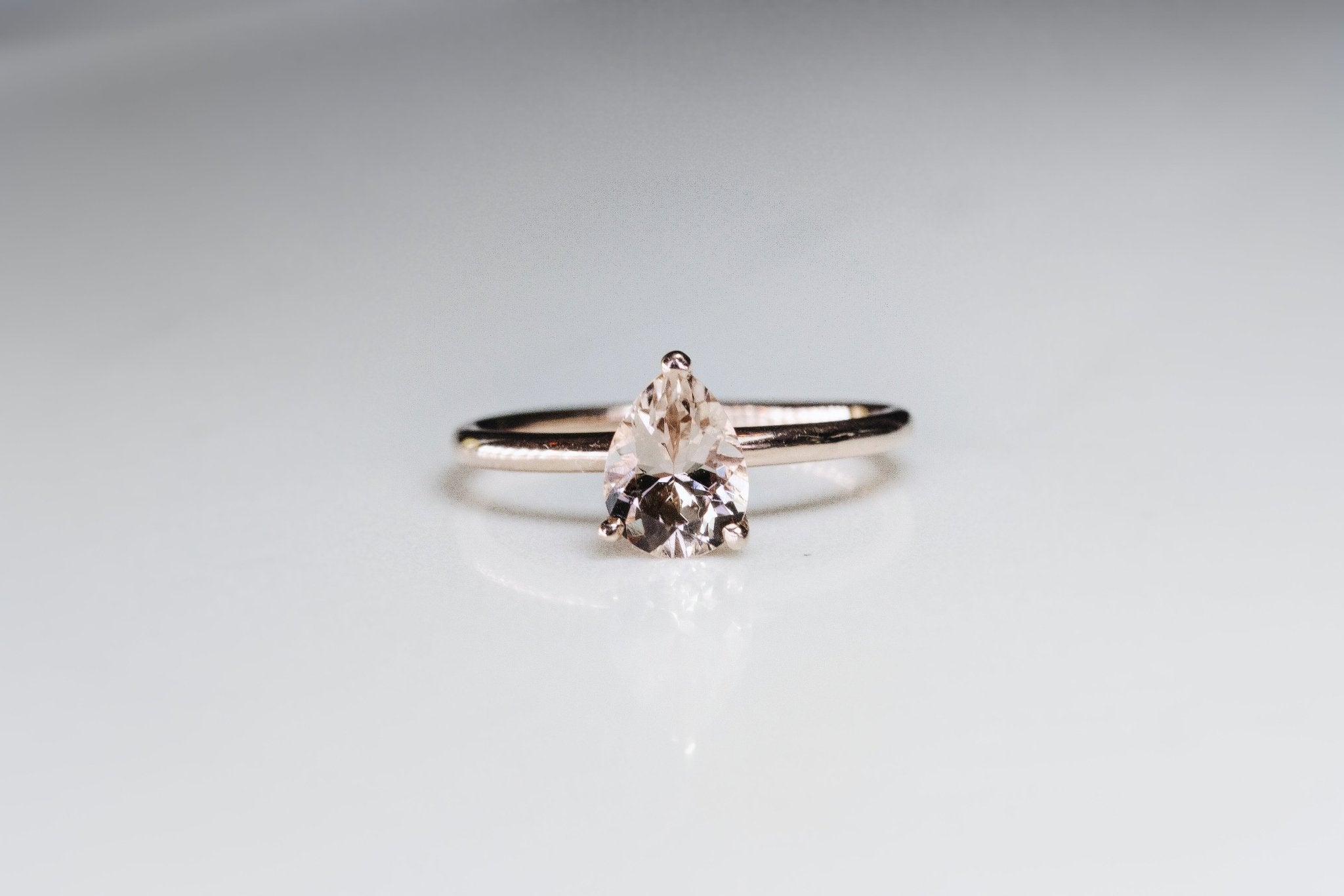 Rings-Feminine, nostalgic nod to the beauty, timelessness and grace of what it means to be woman. Made complete with the pink translucence of natural Morganite stone. Destined to be your forever obsession. An absolute treat for the minimalism lovers. Product Details - Featuring an 8x6mm pear-cut natural Morganite- Ring is 1.80mm wide and 1.80mm thick-ELIISE MAAR JEWELLERY