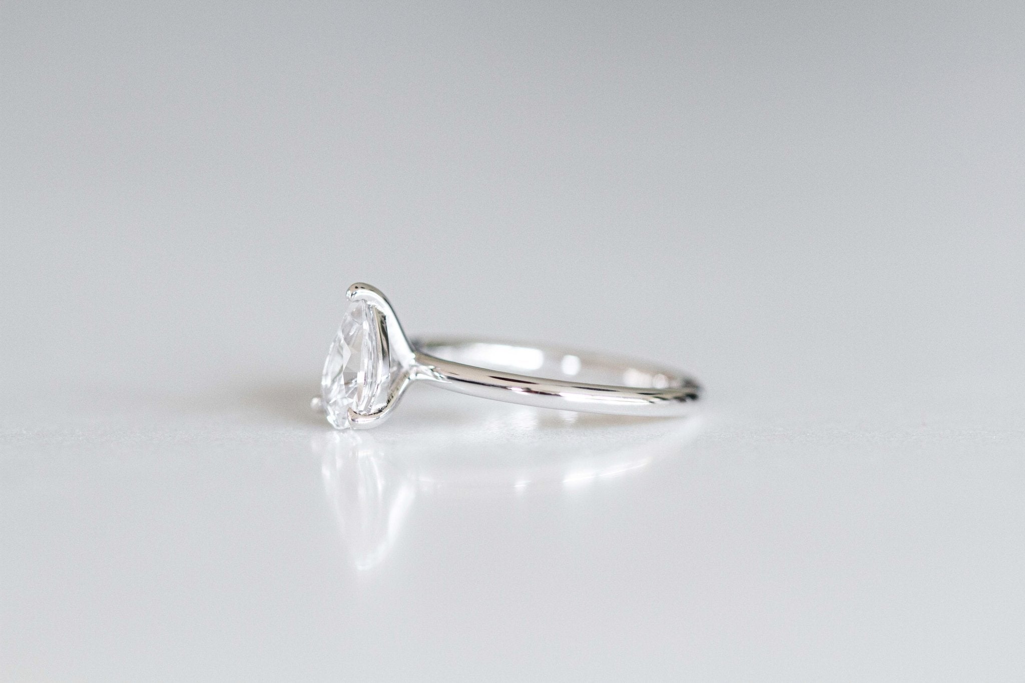 Rings-Feminine, nostalgic nod to the beauty, timelessness and grace of what it means to be woman. Made complete with the pink translucence of natural Morganite stone. Destined to be your forever obsession. An absolute treat for the minimalism lovers. Product Details - Featuring an 8x6mm pear-cut natural Australian sapphire- Ring is 1.80mm wide and 1.80mm thick-ELIISE MAAR JEWELLERY